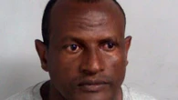 Asylum seeker freed in error from prison seen taking train to London