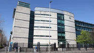 Woman jailed for 12 years for murder of abusive partner while he slept