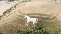 Police investigating damage to Westbury White Horse after red cross pinned to it