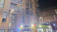 Two people taken to hospital after blaze in East London flat