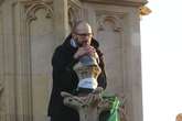 Man arrested after 16-hour Big Ben protest holding Palestinian flag