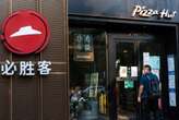 O truque da Pizza Hut para conquistar os chineses: menos luxo, mais pizza