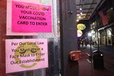 States press forward on vax passports without Biden’s guidance