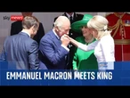 King greets Brigitte Macron with a kiss as French President begins three-day state visit