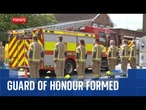 Firefighters form guard of honour after two colleagues and business owner die in Bicester blaze
