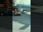 American Airlines passengers flee blazing aircraft