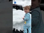 Grandparents bring snow to great-grandbaby