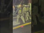 Four detained after anti-ICE protester's fiery clash with officers