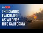 Watch live: Thousands evacuated as powerful wildfire burns homes in Southern California