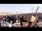 Thousands rush to receive aid at southern Gaza distribution centre