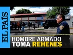 Un HOMBRE ARMADO toma a dos personas como REHENES en un gimnasio de Ciudad de México | EL PAÍS