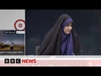 Debris falls in Iranian state TV studio during live broadcast as Israeli strikes continue | BBC News