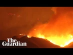 Night footage shows wildfires burning across California hills