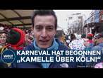 KÖLN: Narren auf den Straßen! Karneval hat begonnen! Menschen feiern bis zum Rosenmontag