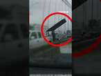 Object from truck smashes into car on NYC bridge