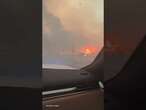 Terrifying moment driver forced to travel through fierce LA wildfire