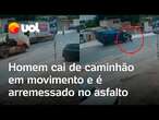 Homem cai de caminhão em movimento no meio de via expressa em BH; vídeo flagra momento da queda