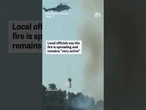 Helicopters try to tame a wildfire in southern France that has eclipsed the size of Paris