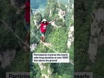 Contestants compete in high-altitude slackline contest