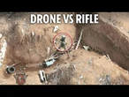 Heart-stopping moment Russian soldier opens fire on drone as explosion rocks trench