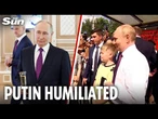 Sheepish Putin steps out to meet sailors after cancelling navy parade over 'security reasons'
