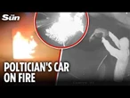 Moment car bursts into flames after hooded arsonists target politician's home