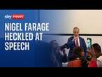 'You're a racist': Seven protesters interrupt Farage speech