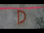 Letras pintadas com spray marcam tragédia na Venezuela | AFP