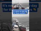 Ship carrying cars battles rough seas