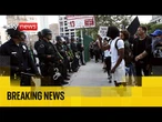 LA riot police set to enforce curfew as protests spread across US