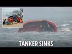 Tanker capsizes in Typhoon Gaemi sparking frantic bid to save crew and stop huge oil spill