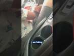 Woman berates man over parking spot