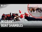 Moment French coastguard hands migrants life-jackets as small boat is allowed to cross to UK