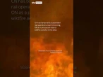 Train engulfed by wall of flames in Canada wildfire