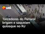 Torcedores do Peñarol brigam, ateiam fogo em ônibus e saqueiam quiosque no Rio de Janeiro; vídeo