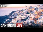 LIVE: Crowds flock to Santorini cliffs as golden sunset descends on Greece