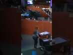 Woman put in handcuffs at city council meeting