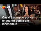 Casal é atingido por carro enquanto comia em lanchonete nos EUA; vídeo flagra o momento do acidente