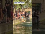 Parisians ignore ban and jump into canal during heatwave