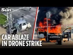 Car EXPLODES in flames leaving three injured after being hit by a drone in Belgorod