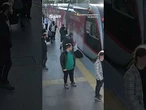 Hair-raising moment security guard saves woman from oncoming tram just in time