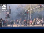 Crowds in downtown Los Angeles start getting dispersed by police