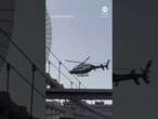 Police helicopter hover near people on top of Brooklyn Bridge - ABC News