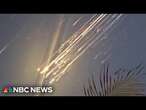 Videos on social media show Starship debris streaming across the sky