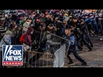 SEE IT: Anti-ICE rioters hurl rocks, try to breach barricades