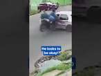 Man crashes into car… but lands on his feet!