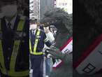 ‘Godzilla’ hits Tokyo streets to promote traffic safety - ABC News