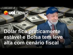 Dólar tem leve queda de olho em isenção do IR e 'shutdown' nos EUA; Bolsa tem leve alta