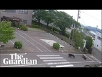 CCTV shows moment bear chases man in Fukushima, Japan