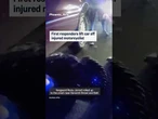 First responders lift car off injured motorcyclist